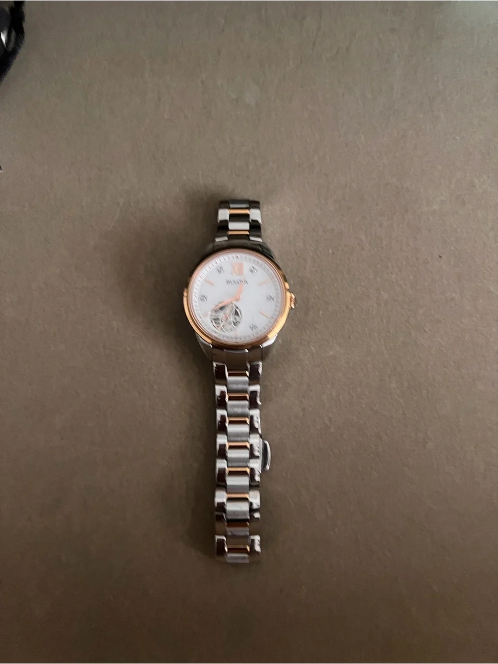 Bulova Two-Tone Silver and Rose Gold Open-Heart Bracelet Watch